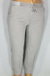 Дамски макси тънък  спортно елегантен панталон в големи размери с   широк ластик и връзки на колана и ластик и капси на крачолите в бежаво рае  03 00566