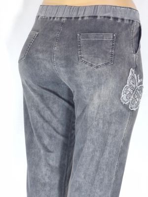 Дамски макси  спортни тънки  еластични дънки в големи размери с нежна апликация пеперуда и камъчета с връзки в сиво   02 00568