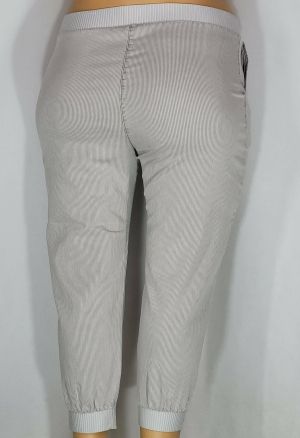 Дамски макси тънък  спортно елегантен панталон в големи размери с   широк ластик и връзки на колана и ластик и капси на крачолите в бежаво рае  03 00566