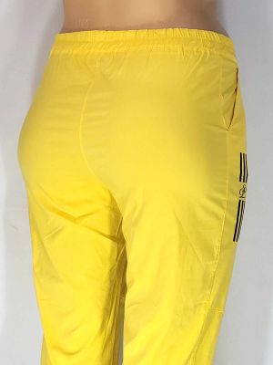 Дамски макси спортни летни еластични панталони в големи размери с интересна щампа в жълто 03 00463
